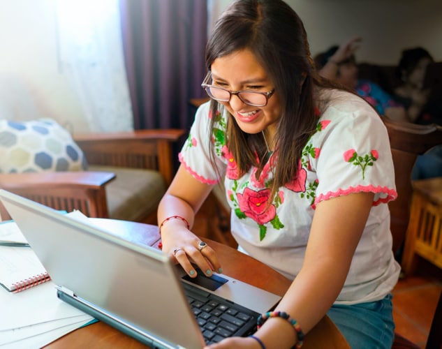 Girl looking at laptop